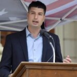 Rep. Tom Barrett argues his opponent's radical views are disqualifying