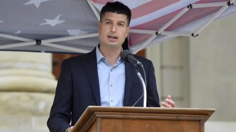 Rep. Tom Barrett argues his opponent's radical views are disqualifying