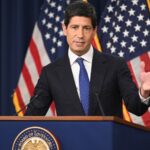 Three words from Kevin Warsh have Wall Street wondering how far the Fed will go with rate hikes