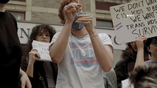 Transgender activists inject hormones outside NYU hospital in viral stunt