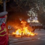 France riots prompt Macron to order security review after looting