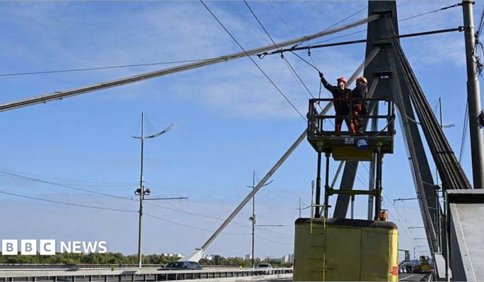 Kyiv bridge hit in further drone attack as German chancellor makes surprise visit