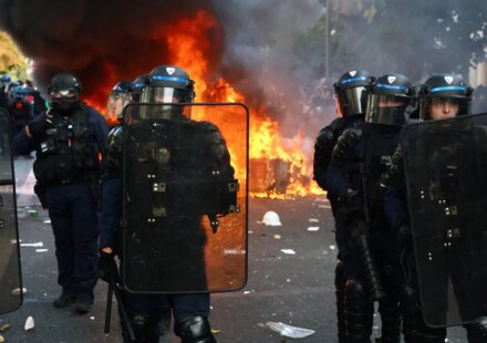 Macron heads to Kuwait for energy talks while France riots rage on