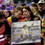 Tens of thousands march in Madrid to mourn pensioner whose eviction sparked housing protests